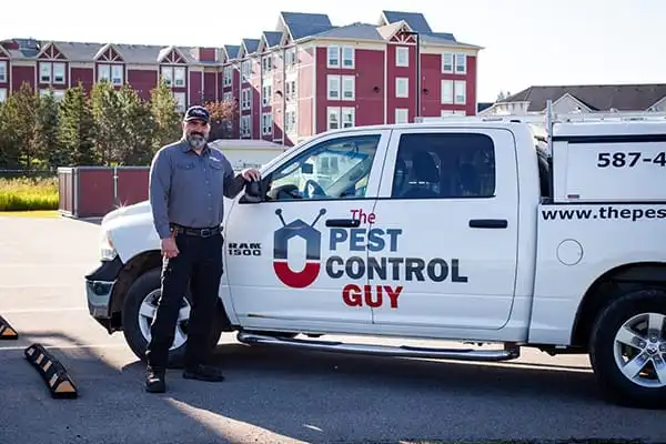 The Pest Control Guy service vehicle at a Calgary property
